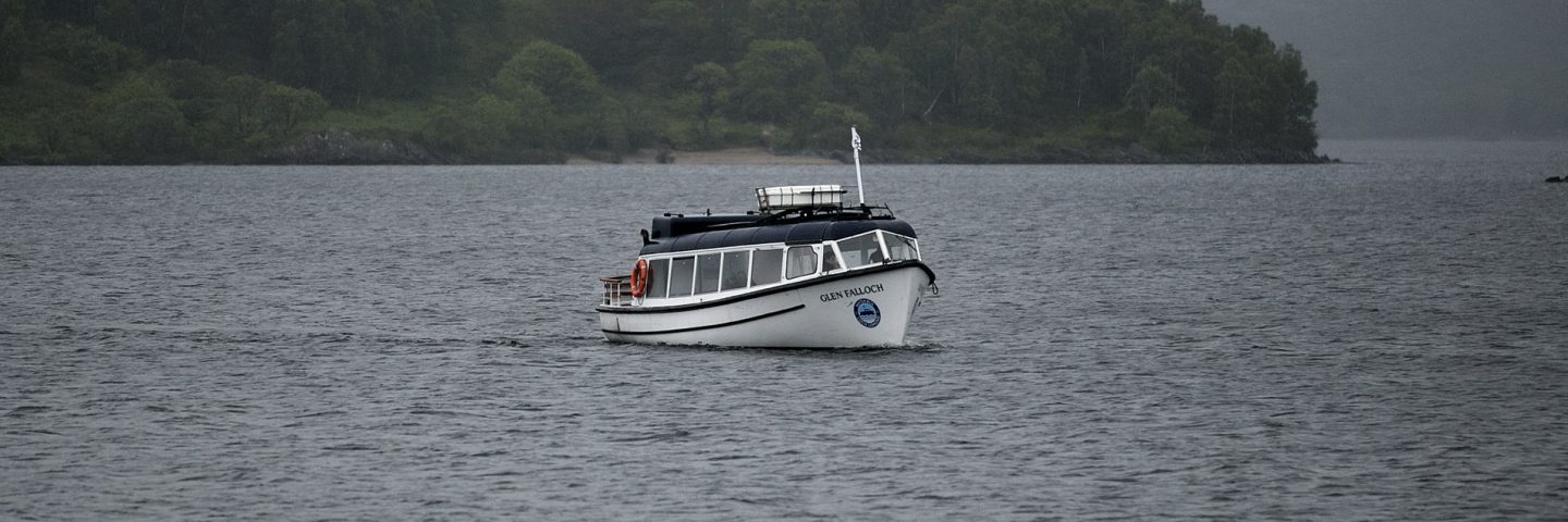 waterbus-crossing-water-misty-day-on-loch