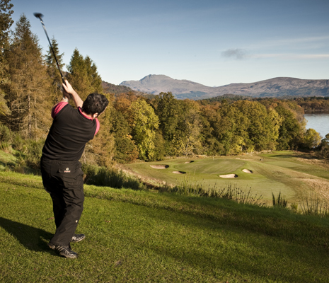 man-playing-golf-loch-lomond-and-ben-lomond-visible-in-the-distance