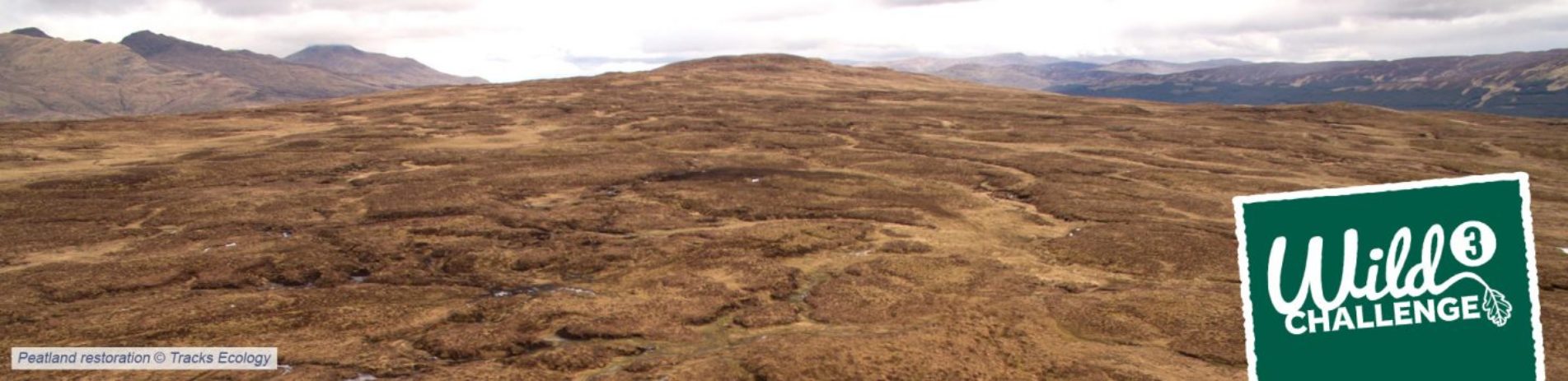 large-expanse-of-peatland-brown-hills-with-text-in-corner-reading-wild-challenge-three