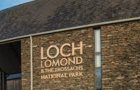 loch-lomond-trossachs-national-park-headquarters-building-with-logo-prominent-over-main-entrance