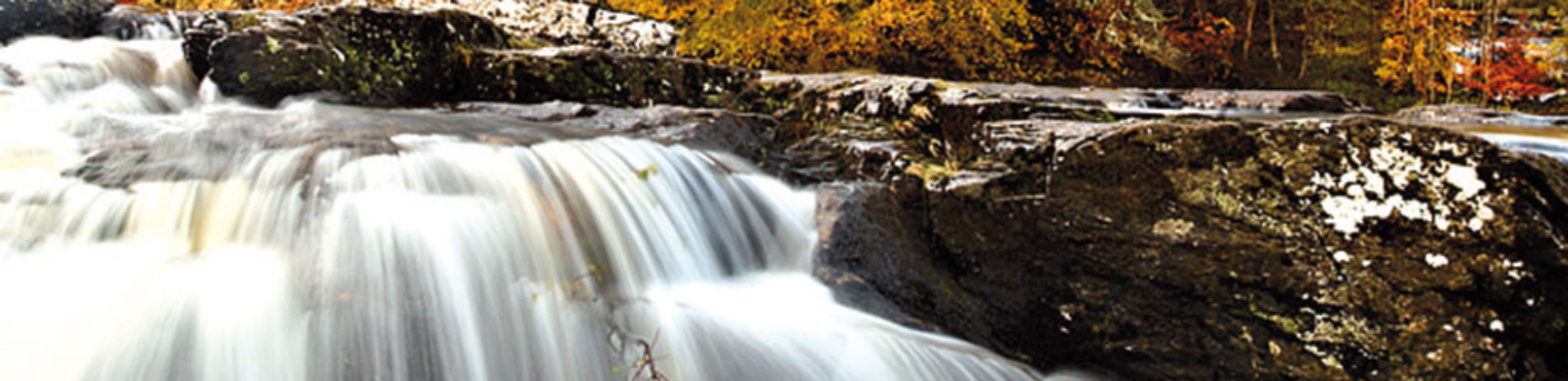 fast-flowing-water-over-waterfall