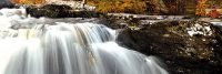 fast-flowing-water-over-waterfall