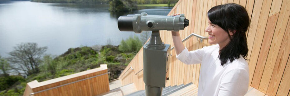 lady-using-binoculars-at-viewpoint