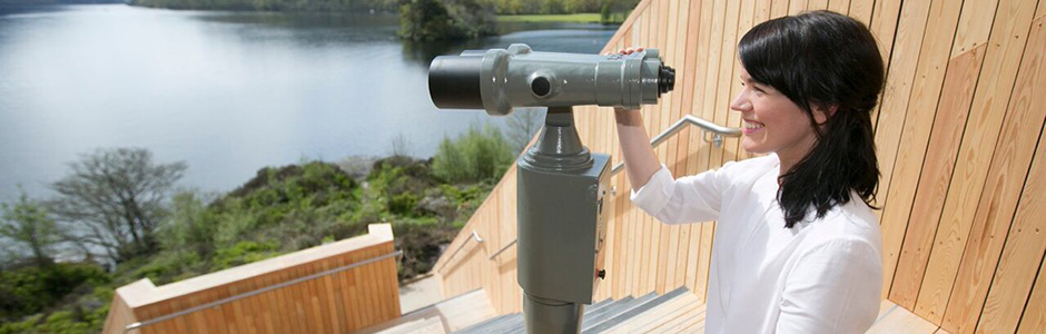 lady-using-binoculars-at-viewpoint