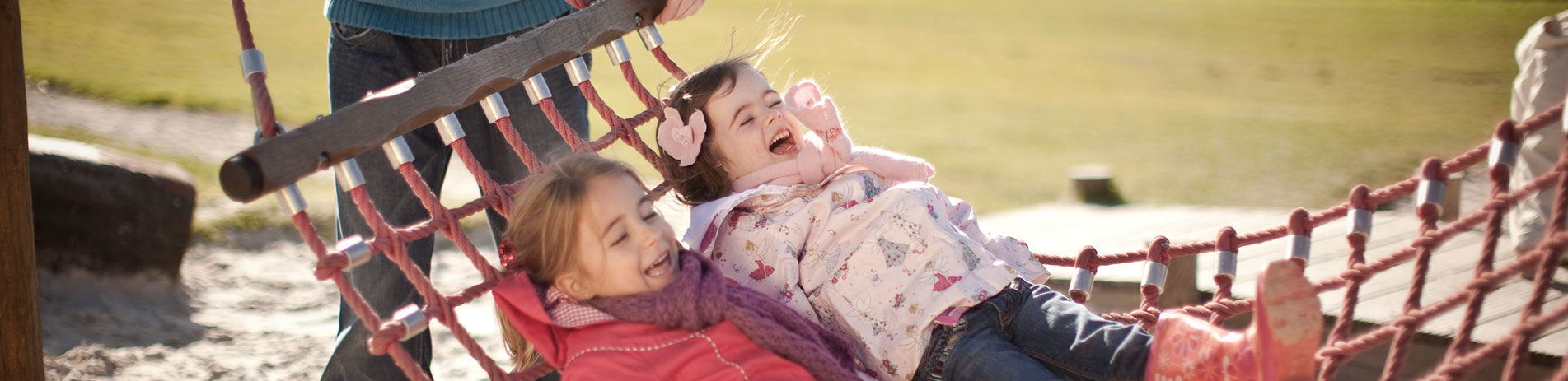 children-on-hammock-swing