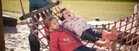 children-on-hammock-swing