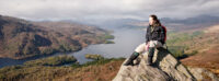 girl-sitting-mountain-top