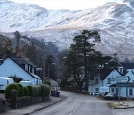 arrochar-village-with-snowy-mountains-behind