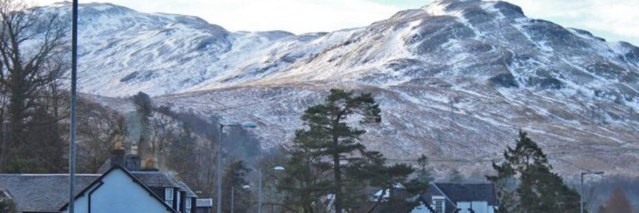 villiage-centre-and-snow-covered-mountain