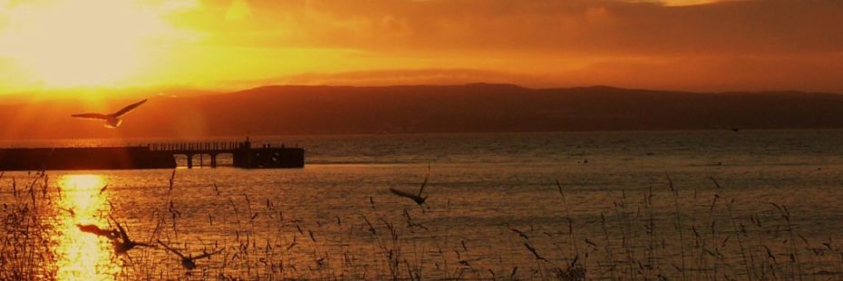 sunrise-over-loch-pier-and-mountains