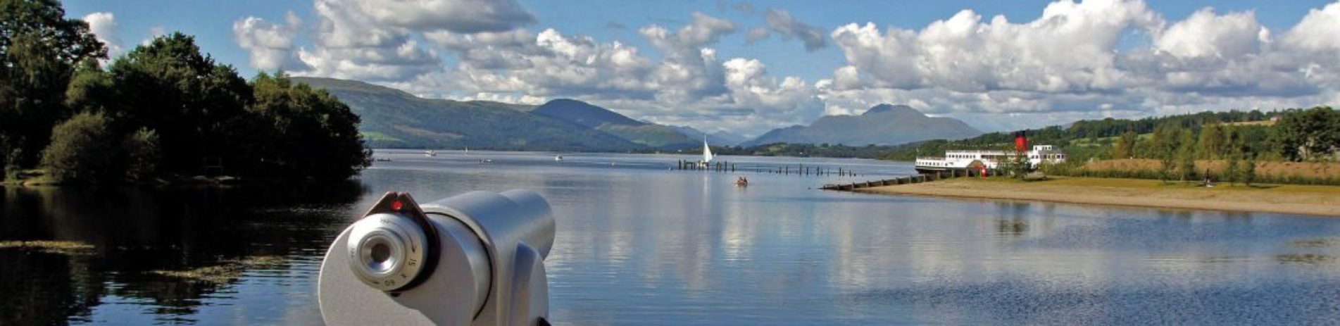 panoramic-from-bay-of-loch-mountains-on-a-sunny-day