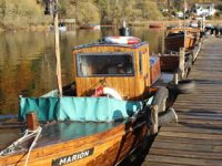 balmaha-wooden-pier-with-boats-moored-the-foreground-one-is-called-marion