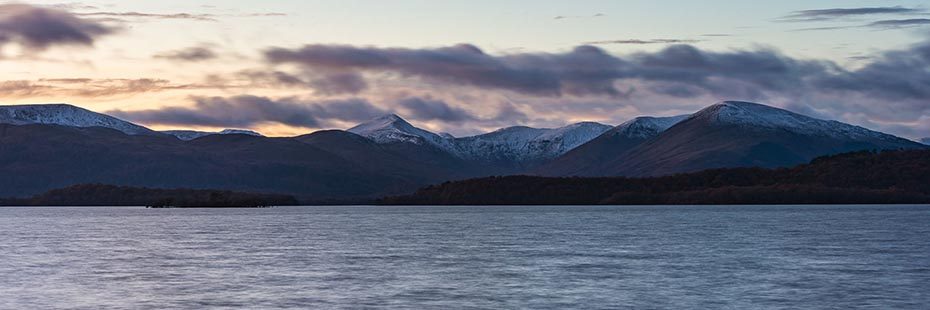 luss-hills-covered-with-a-smattering-of-snow-above-loch-lomond-and-dusk