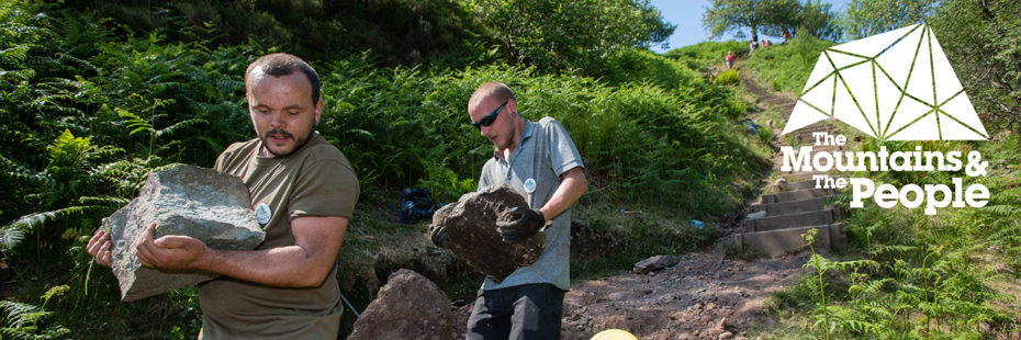 two-men-carrying-rocks-with-mountains-and-the-people-logo