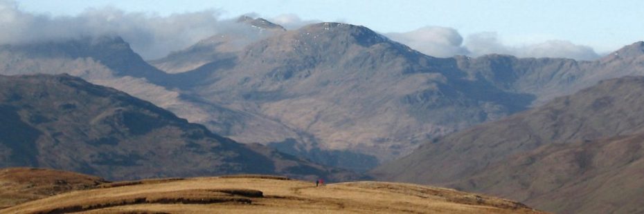 view-of-arrochar-alps-with-some-clouds-hanging-over-summits-seen-from-beinn-dubh-hill