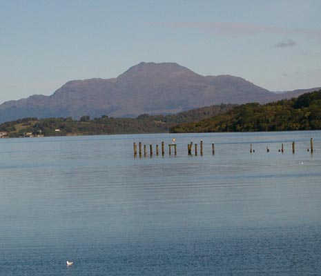 ben-lomond-view-of-disused-pier-and-ben-lomond-toweringa-above-forests-behind