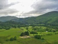 green-lush-glen-floor-and-saint-fillans-village-in-distance-seen-from-dundurn-hill