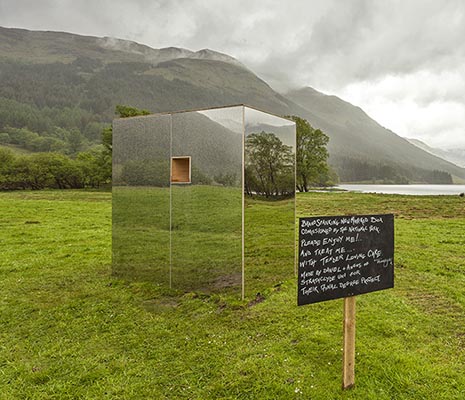 lookout-mirror-cabin-in-middle-of-fields-with-loch-doine-behind-and-high-breadalbane-hills-low-clouds