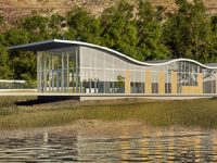 ripple-retreat-modern-building-steel-and-glass-wavy-roof-at-edge-of-loch-venachar