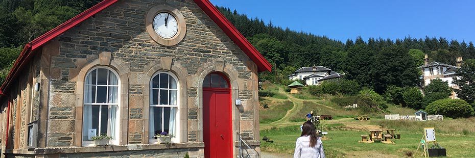 blairmore-village-hall-with-woman-walking-towards-it