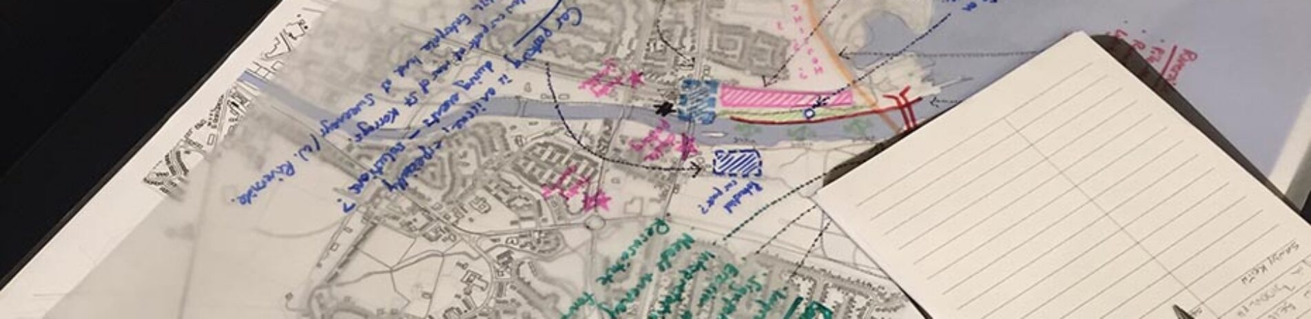 annotated-plan-of-village-or-town-and-paper-covered-by-notes-on-top-of-it