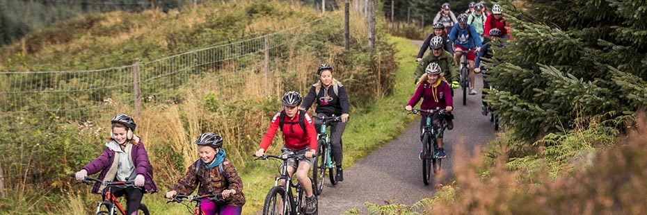 group-of-young-people-cycling-on-national-cycle-route-seven-in-glen-ogle