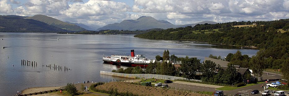 south-shores-of-loch-lomond-with-maid-of-the-loch-steamship-in-the-foreground-and-ben-lomond-and-luss-hills-in-the-background