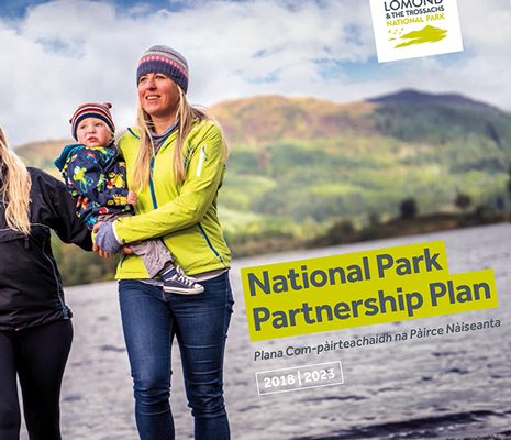 national-park-partnership-plan-cover-crop-two-blonde-women-holding-baby-with-loch-chon-backdrop