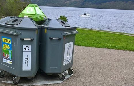 waste-bins-at-tarbet-car-park-with-loch-lomond-and-boats-visible-on-the-right