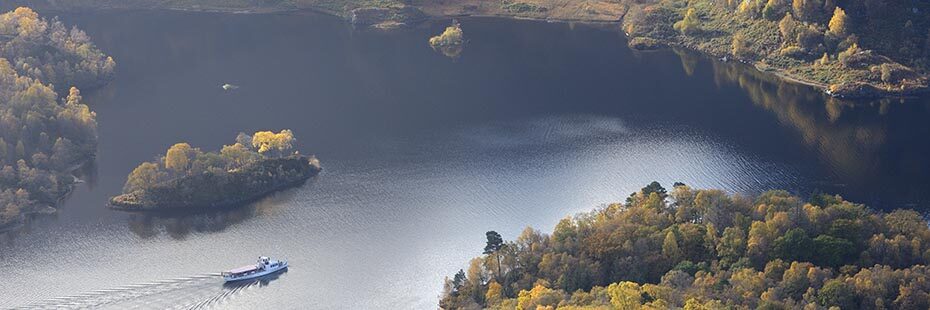 aerial-view-of-the-great-trossachs-forest-steamship-sir-walter-scott-sailing-on-loch-katrine