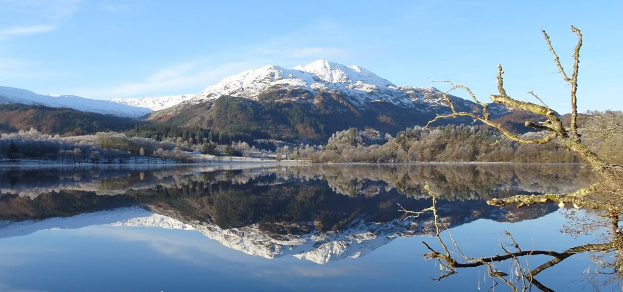 young-people-photo-competition-image-of-ben-venue-mountain-covered-by-snow-reflecting-like-a-mirror-in-loch-achray-below-blue-skies-above