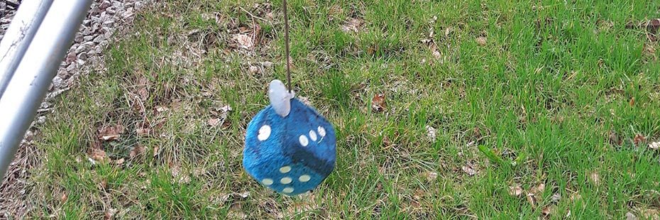 furry-blue-dice-found-beside-the-a-eighty-two-road-during-spring-litter-pick