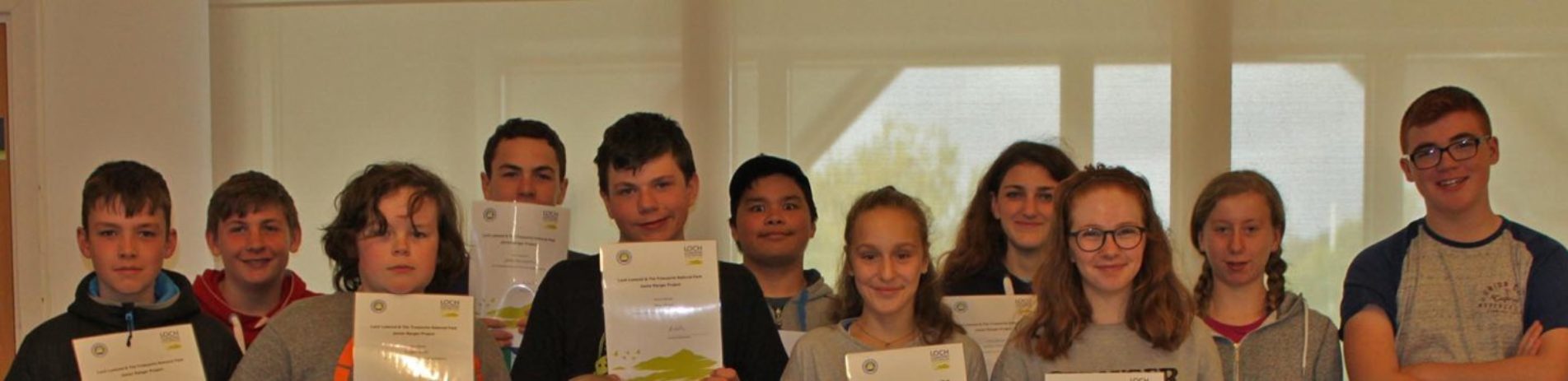 junior-rangers-students-holding-their-new-certificates-proudly