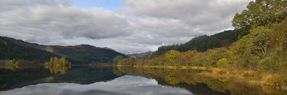 trees-and-mountains-reflected-in-loch-ard