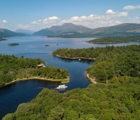 aerial-image-of-loch-lomond-with-narrows-between-islands-in-the-foreground-and-ben-lomond-in-the-distance