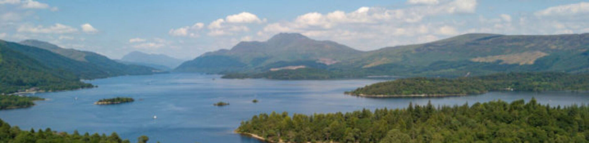 aerial-image-of-loch-lomond-with-narrows-between-islands-in-the-foreground-and-ben-lomond-in-the-distance