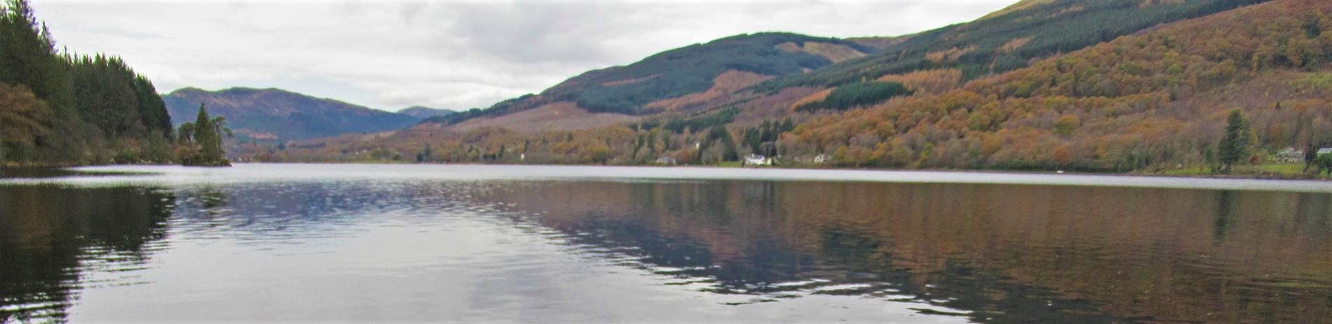 loch-ard-surrounded-by-forested-hills-in-the-autumn