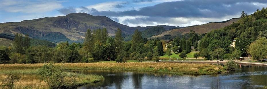 callendar-meadows-with-river-teith-in-foreground-and-bed-ledi-in-the-distance