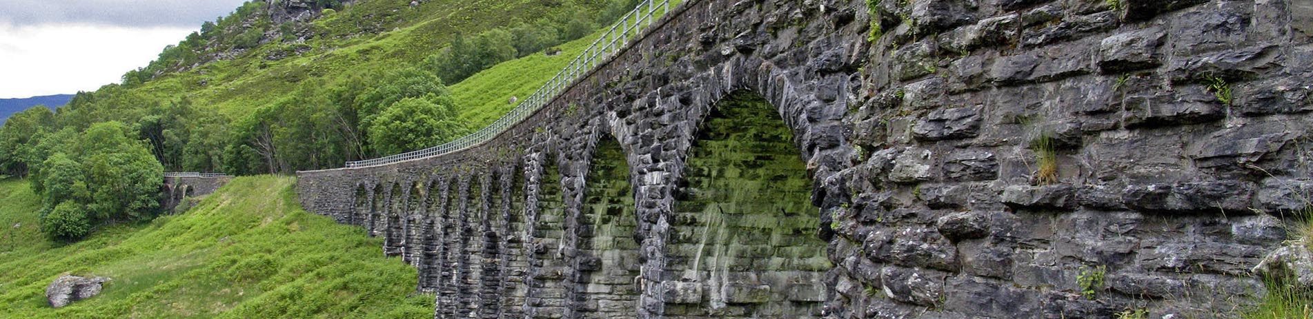 glen-ogle-viaduct-arches-visible-in-foreground-trees-in-the-background