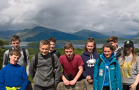 group-of-junior-rangers-looking-to-camera-with-loch-lomond-in-the-background