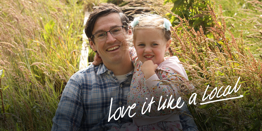 man-and-child-asking-visitors-to-love-the-park-like-a-local