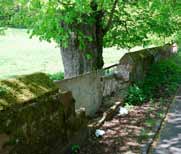 collapsed roadside wall