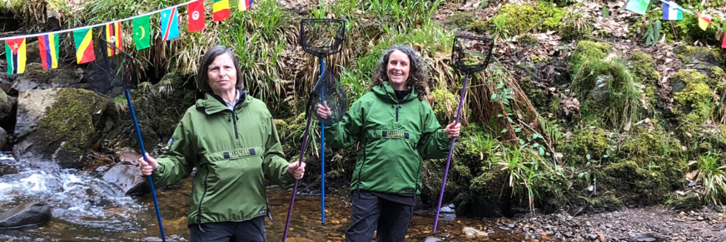 Two Volunteer Rangers, having fun doing practical conservation tasks