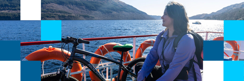 Cyclist on waterbus at Tarbet, north Loch Lomond