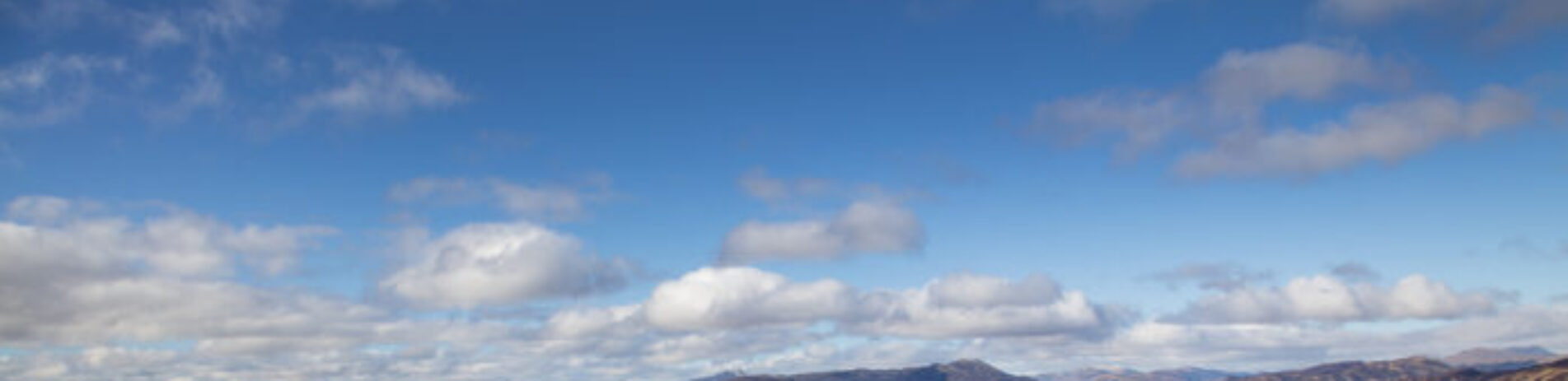 View across lochs and mountains from Ben Gullipen