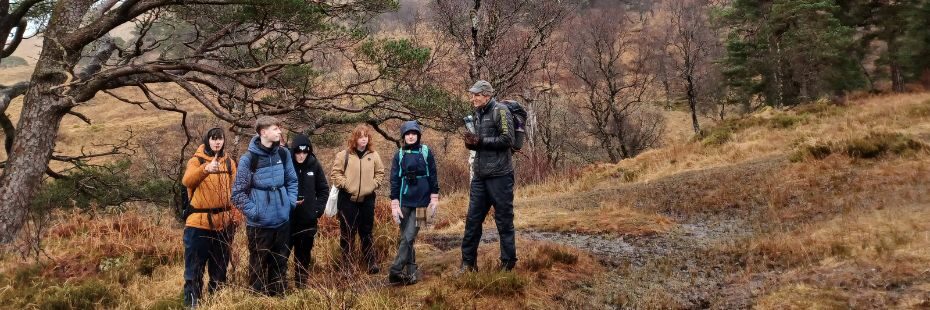A group of people in a natural landscape